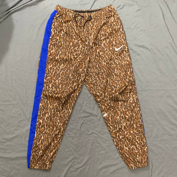 Nike wild cheetah print joggers track pants woven